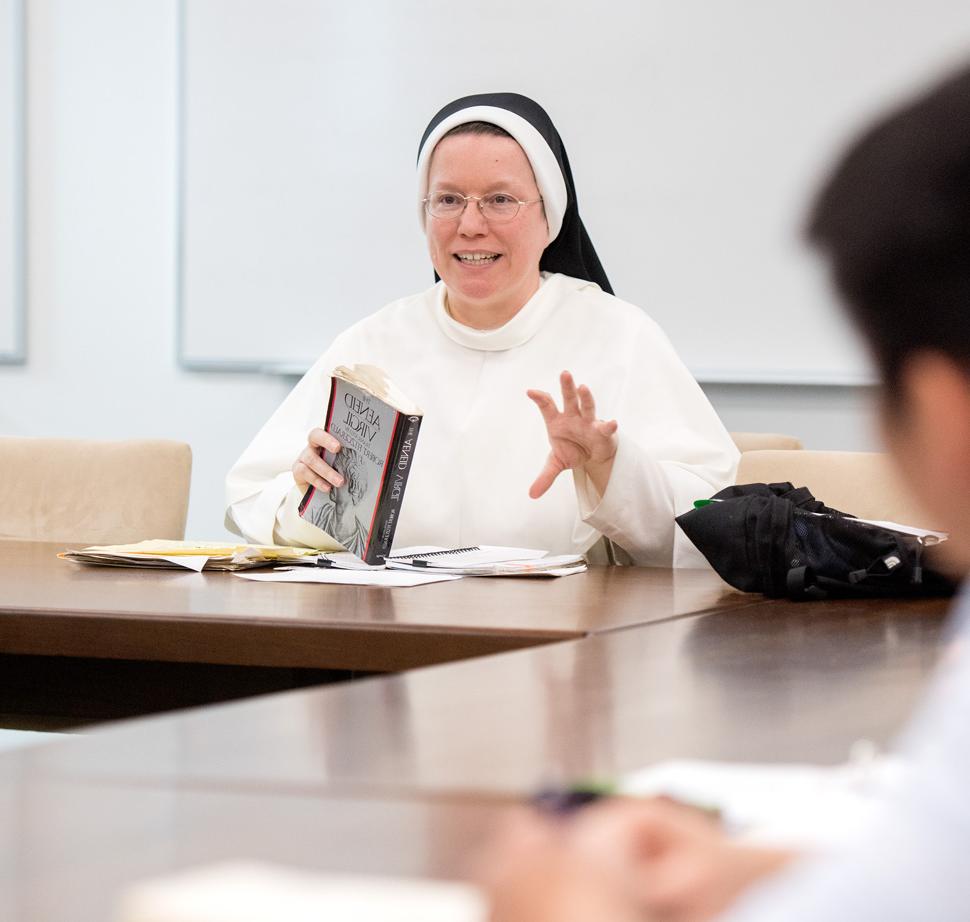 Sister teaching in Classroom